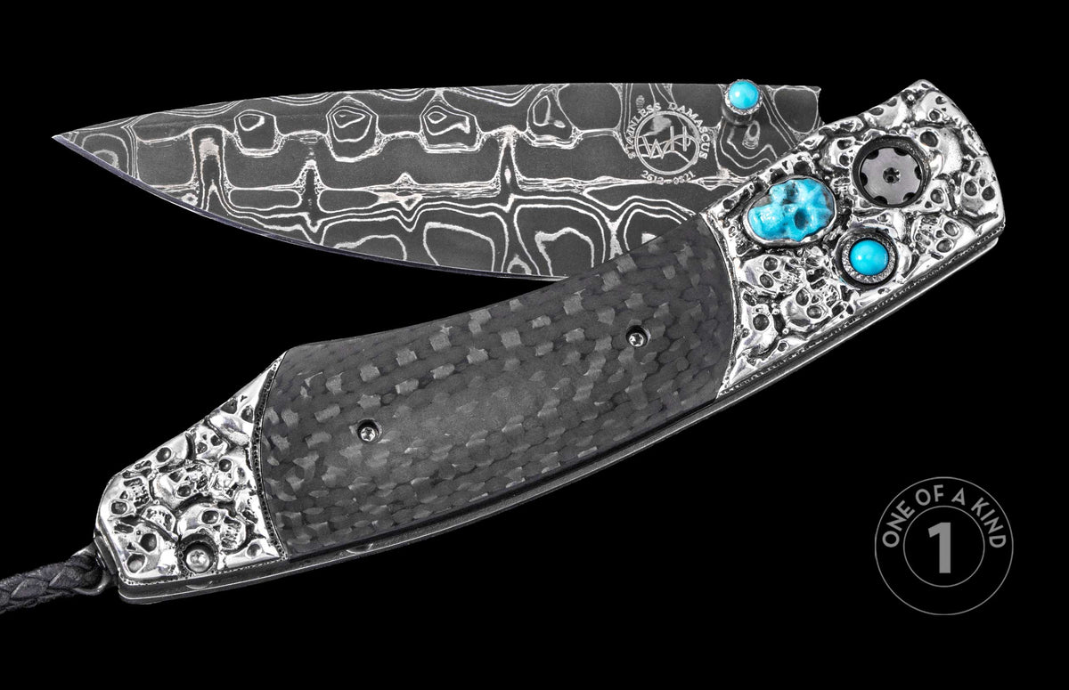 Damascus steel folding knife with carbon fiber handle and turquoise skull inlays, one of a kind, side view