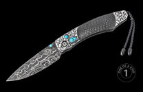 Damascus steel knife with carbon fiber handle by Karambit, featuring skull engravings, turquoise inlays, and braided lanyard, side view