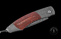 Luxury folding knife with red textured inlay and damascus steel handle, one of a kind, side view