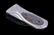 William Henry money clip on back background