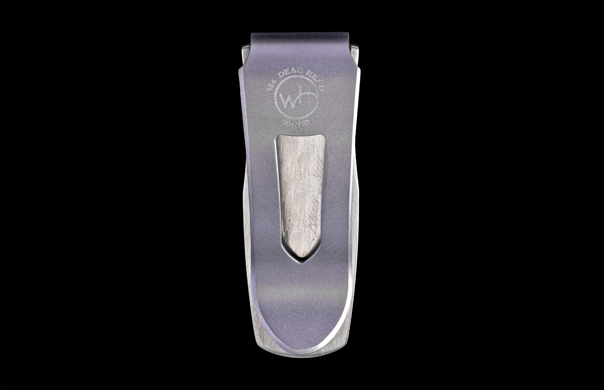 Silver brushed metal money clip with "M4 DEAD HEAD", "WH" logo, and "001/100" engraved.