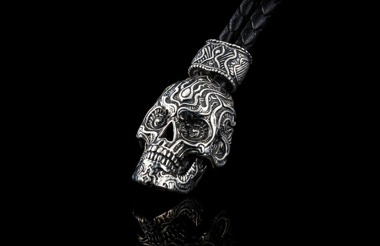 William Henry Kay Fob with a sculpted sterling silver sugar skull, a round-braided black leather cord, and stainless steel hook.
