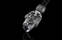William Henry Kay Fob with a sculpted sterling silver sugar skull, a round-braided black leather cord, and stainless steel hook.