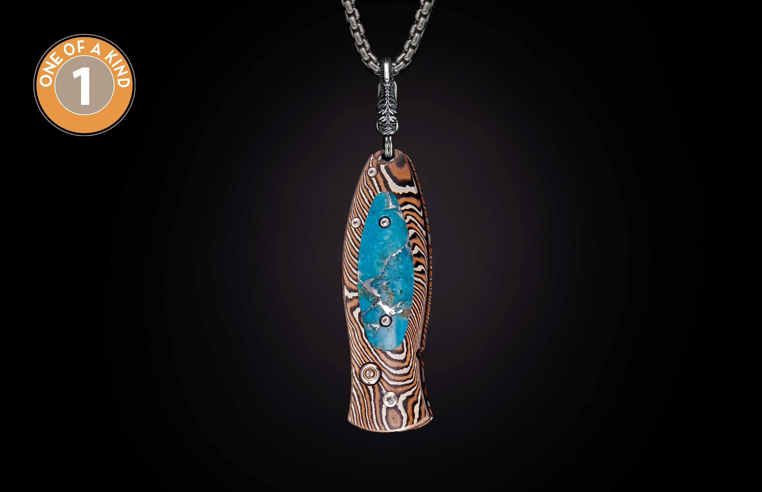 Knife pendant with brown and white striped wood, blue turquoise inlay, hanging on a silver chain.