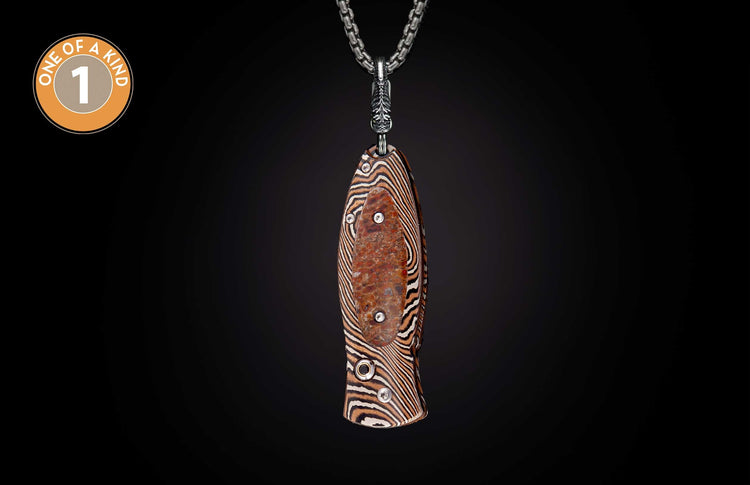 Knife with a brown and white wavy striped handle, featuring a mottled reddish-brown insert with silver rivets, hanging from a silver chain.