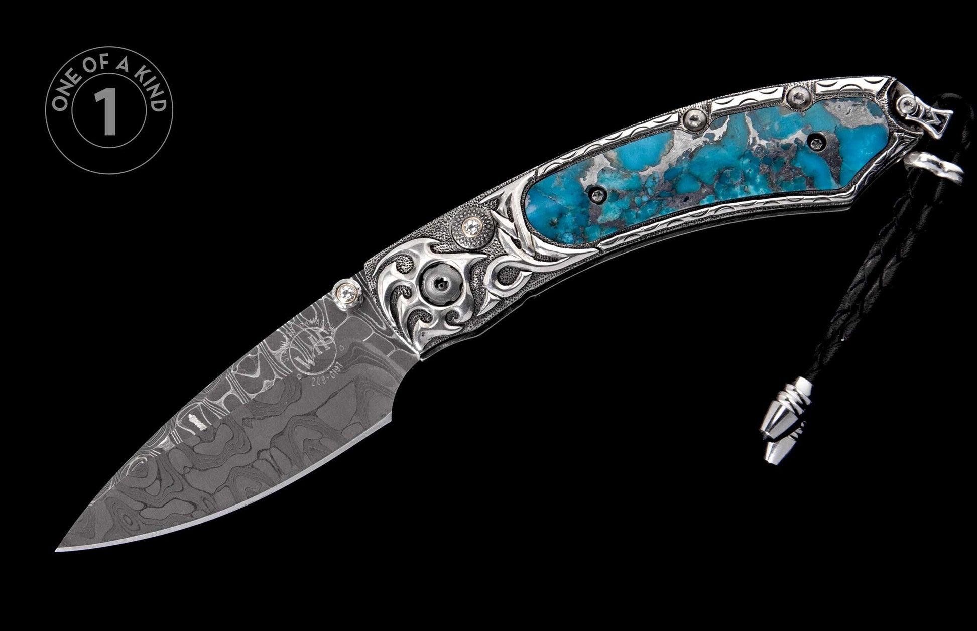 Ornate folding knife with a patterned Damascus blade and a turquoise and silver handle, featuring scrollwork, gemstones, and a black leather lanyard.