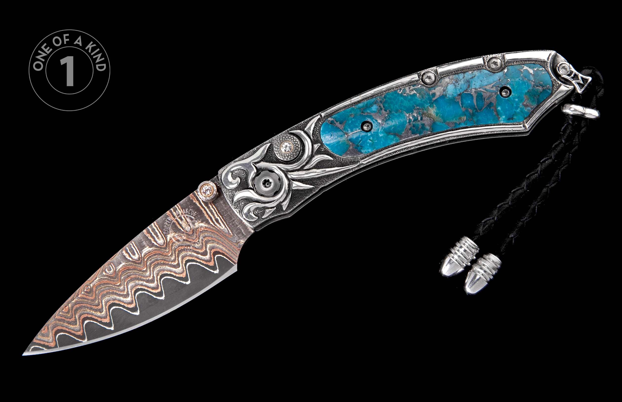 Folding knife with a wavy copper Damascus blade, ornate silver handle, bright blue turquoise inlays, and black braided lanyard.