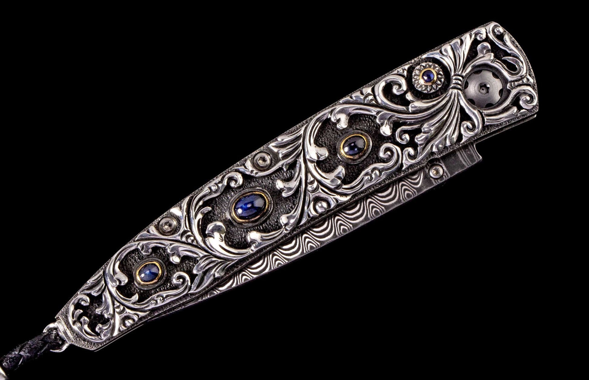 The Radiant Hand-Carved Sterling Silver Pocketknife