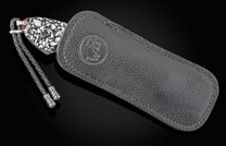 Custom William Henry Wave Mokume folding knife with hand-forged damascus blade