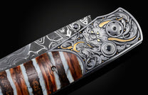 000 year-old fossil Woolly Mammoth tooth in a brilliant striped color pattern. The blade is hand-forged