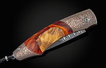  and a hand forged damascus steel blade