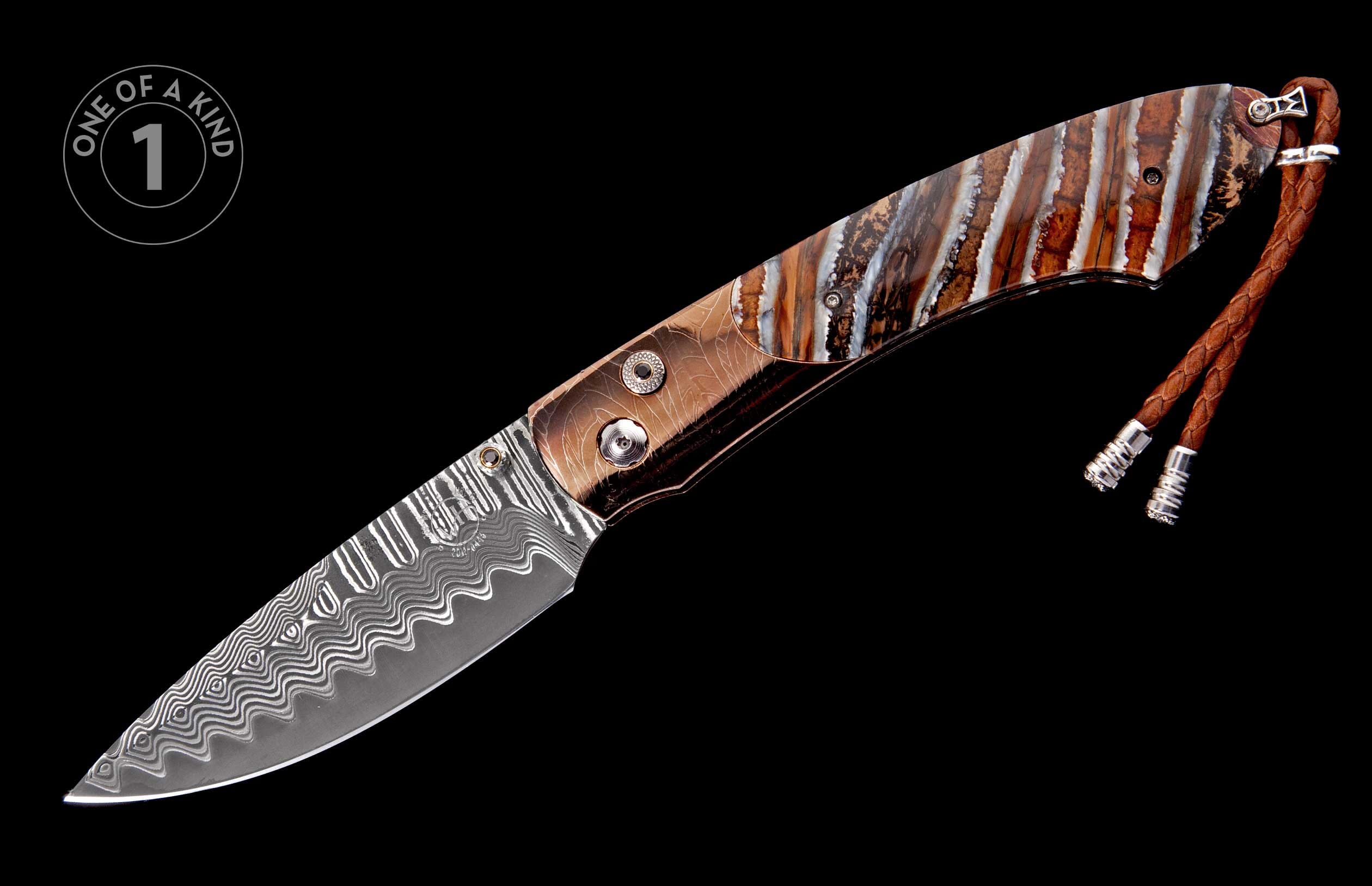Folding knife with a wavy Damascus steel blade, a brown and white striped handle with copper accents, and a braided leather lanyard.
