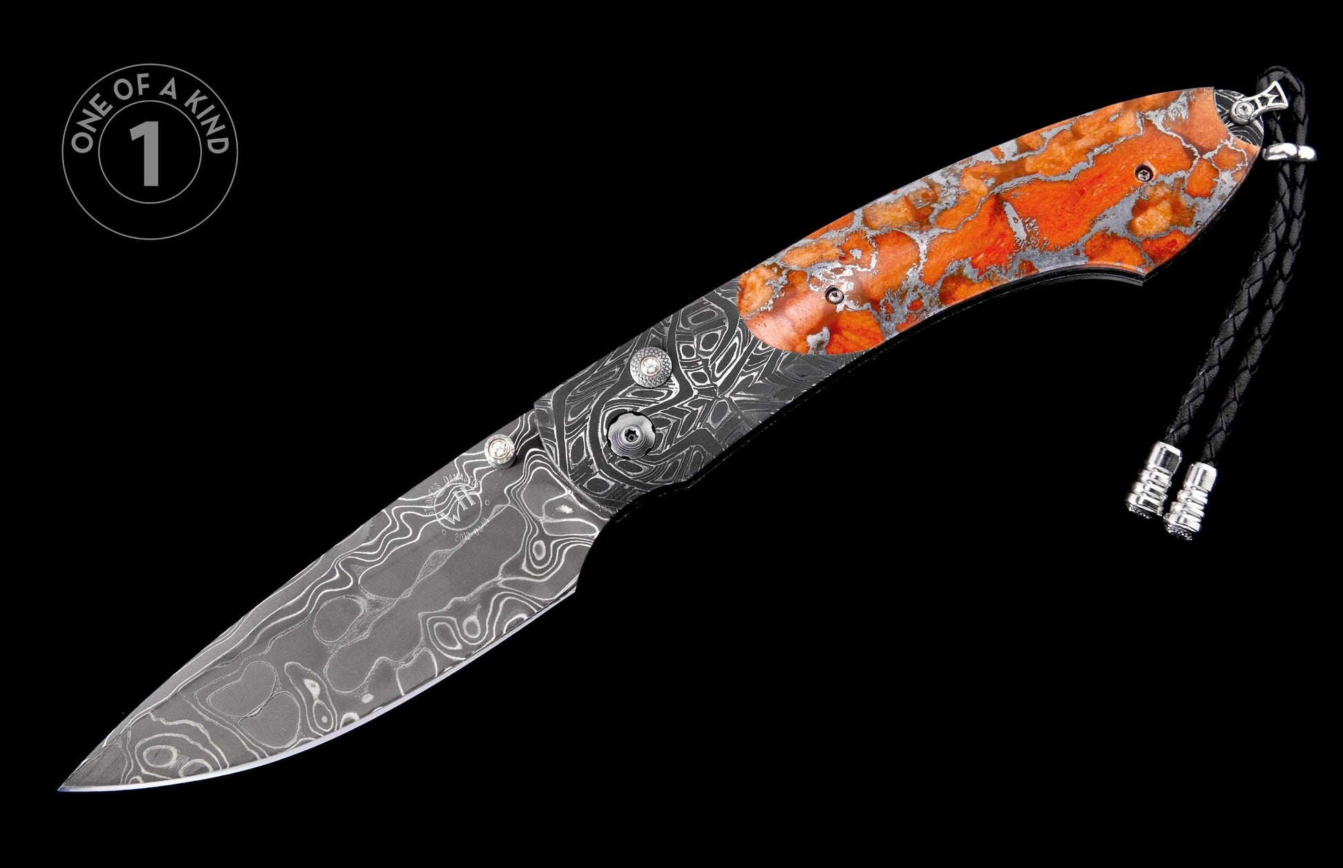 Side view folding knife with swirling Damascus steel blade, orange and silver patterned handle, and braided leather lanyard.