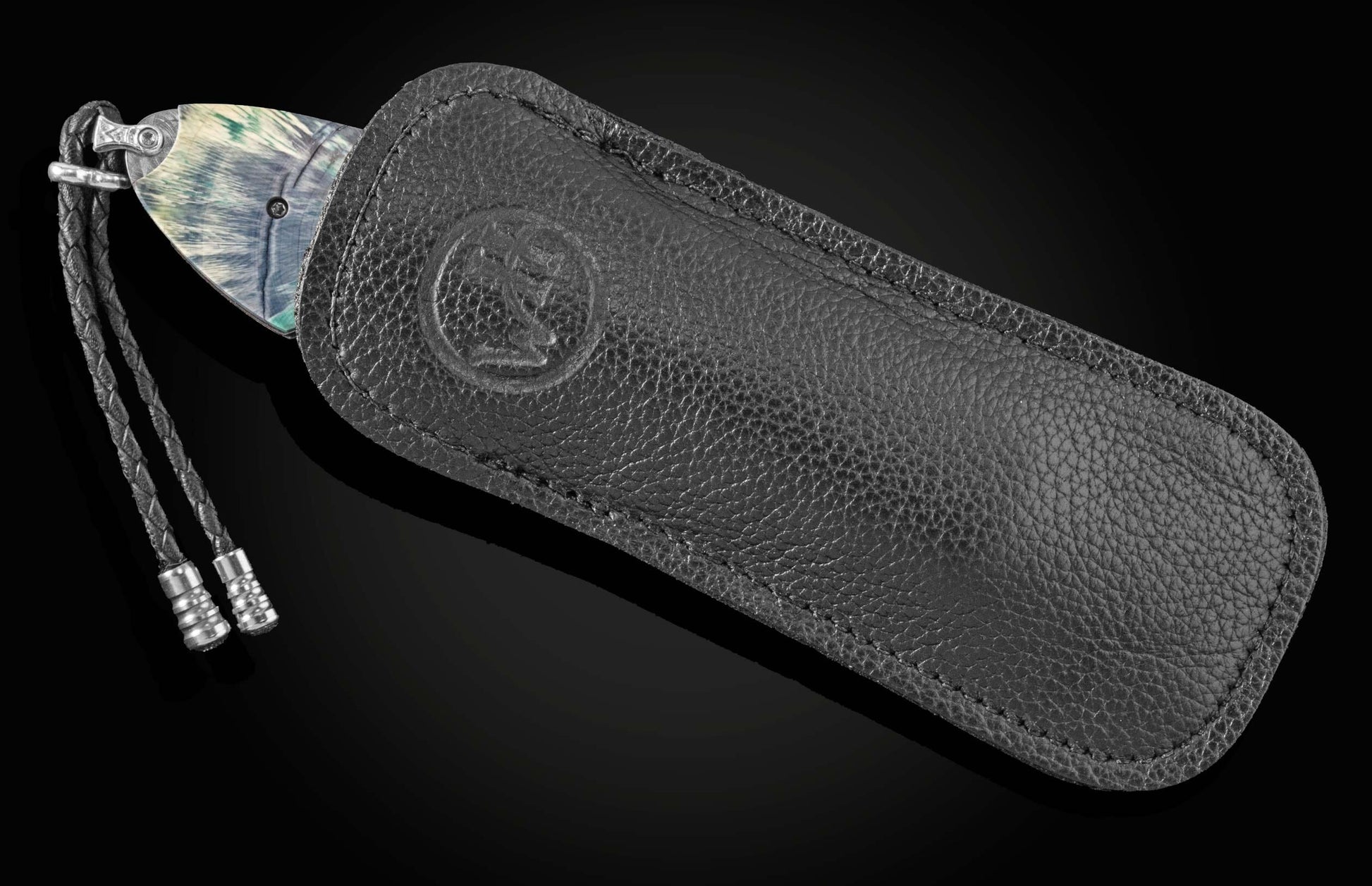 Custom William Henry knife featuring hand-engraved ducks in 24K yellow and 18K green gold