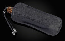 Handcrafted William Henry knife with high detail micro machined paisley pattern bronze titanium handle
