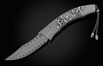  and a Damascus steel blade.