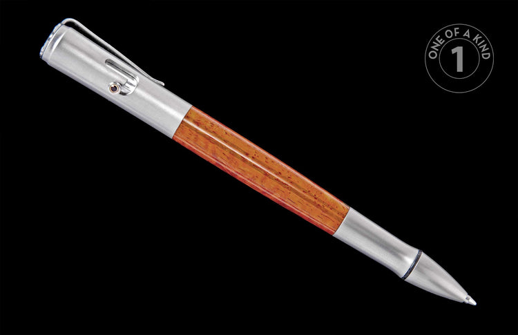 Silver and reddish-brown pen with brushed metal ends and a wood grain body, featuring a clip with a small dark red accent, shown diagonally.