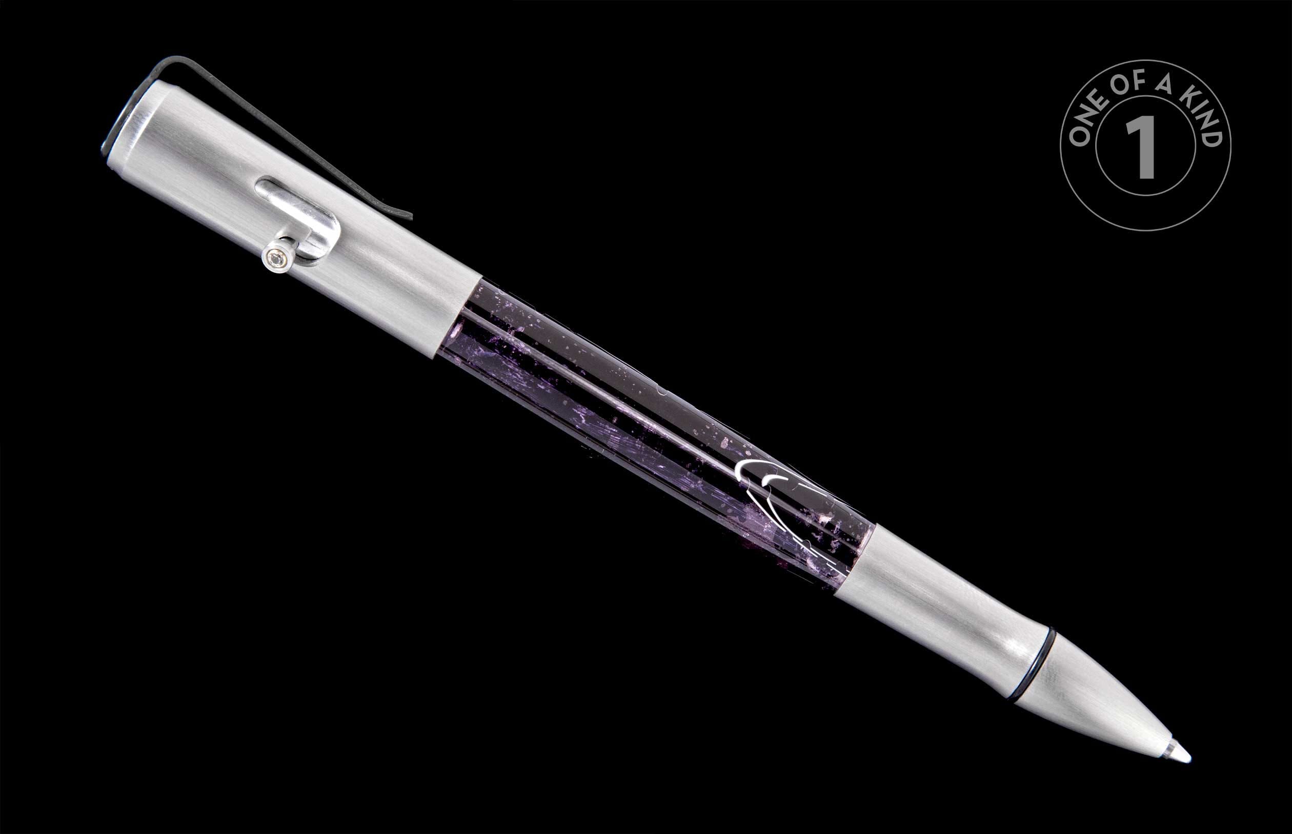 Silver brushed pen with a clear barrel showcasing purple and white internal swirl designs, featuring a metal clip.