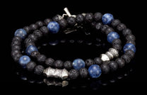 Blue sodalite and black lava stone beaded bracelet with silver-toned accents and a toggle clasp.