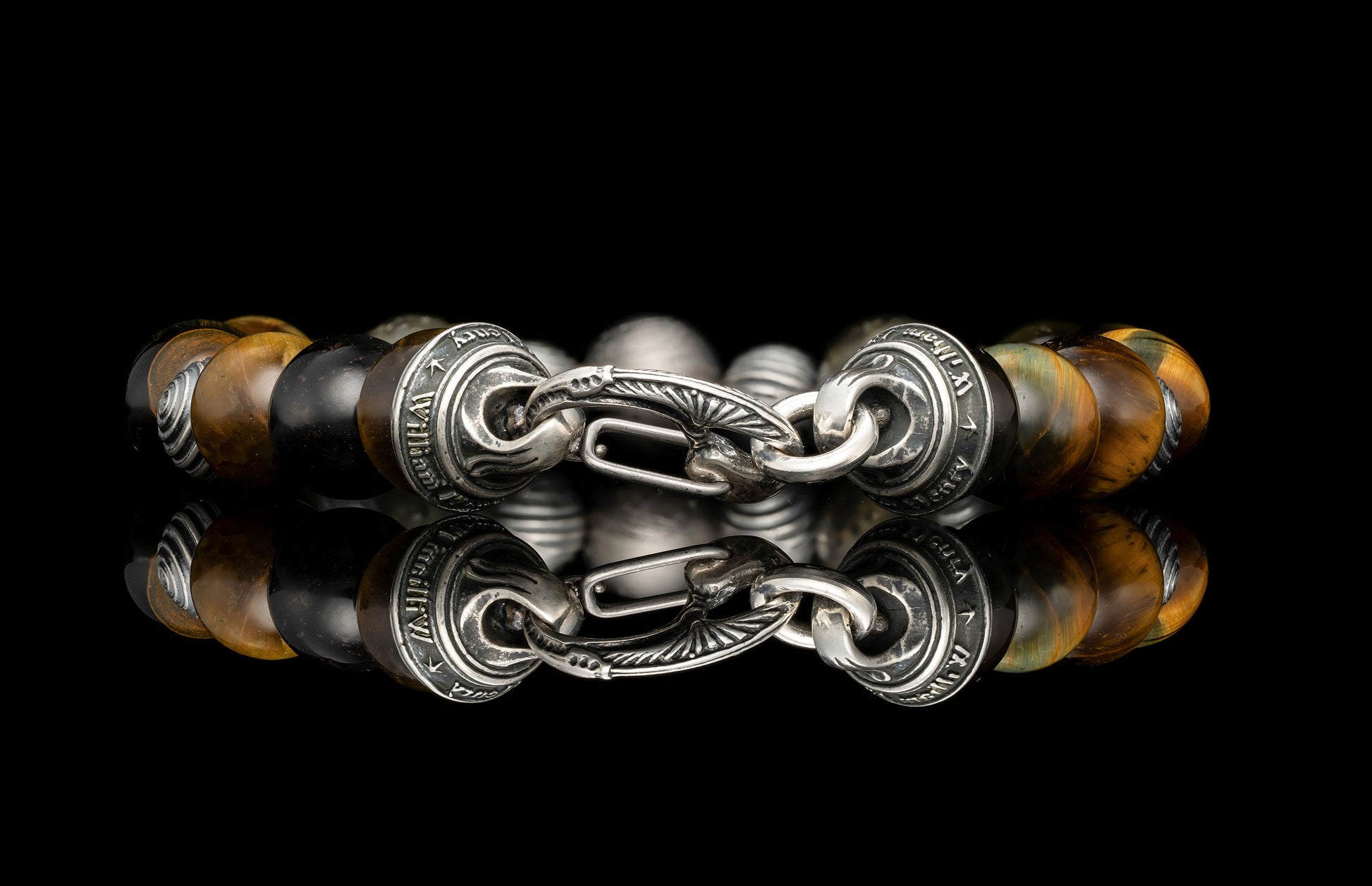 Beaded bracelet with meteorite, dinosaur bone, and Tiger's Eye beads