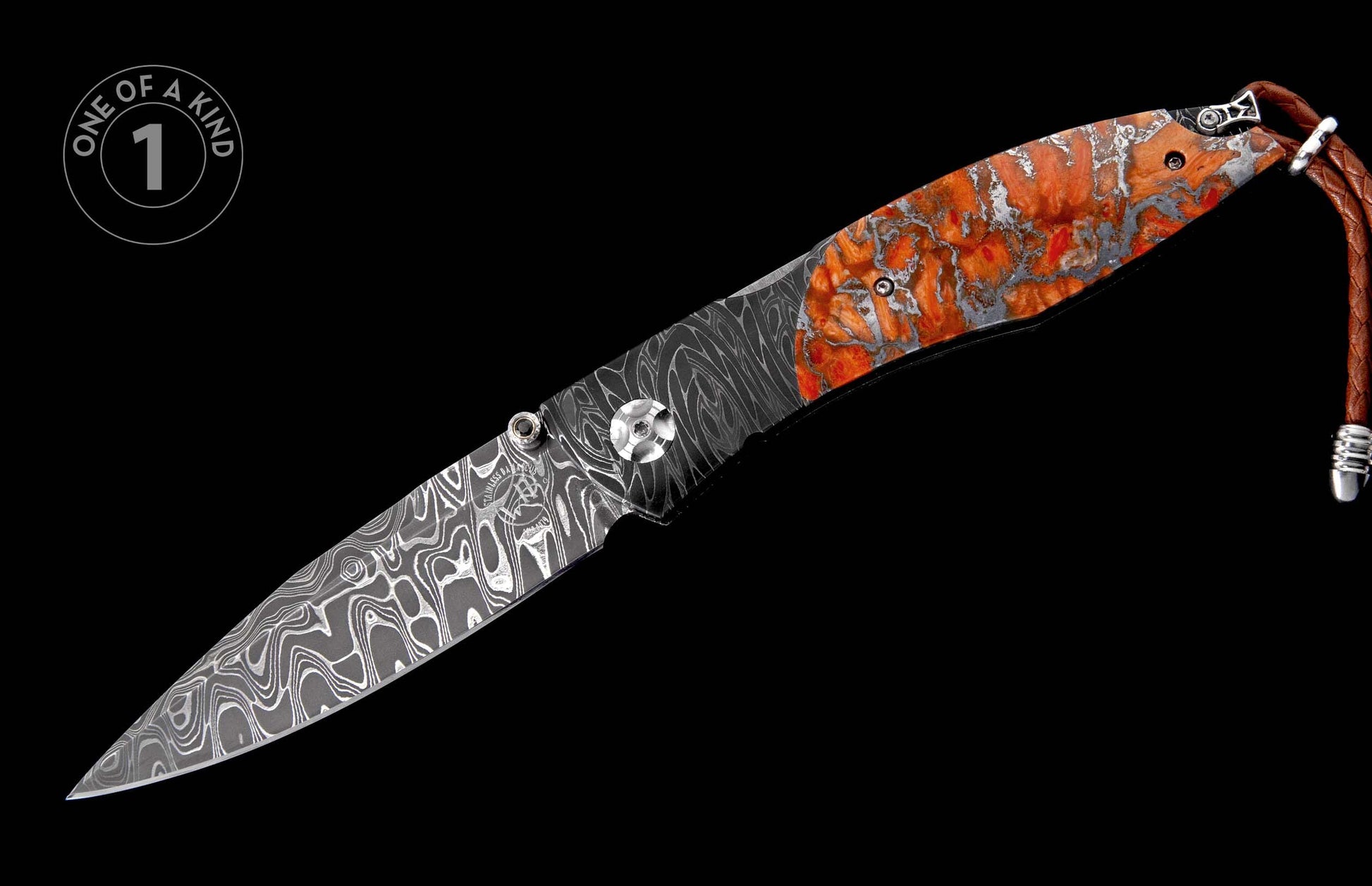 Folding knife with an intricate Damascus blade, a unique orange marbled handle, and a brown leather lanyard.