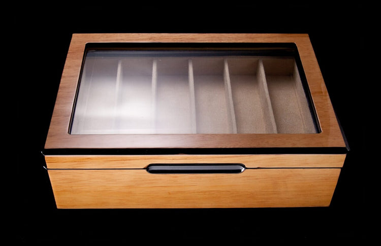 Light brown wooden collector display case with a clear glass lid, black trim, a sleek front groove, and six felt-lined compartments.