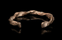 Twisted bracelet on a black background