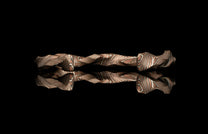 Twisted bracelet on a black background