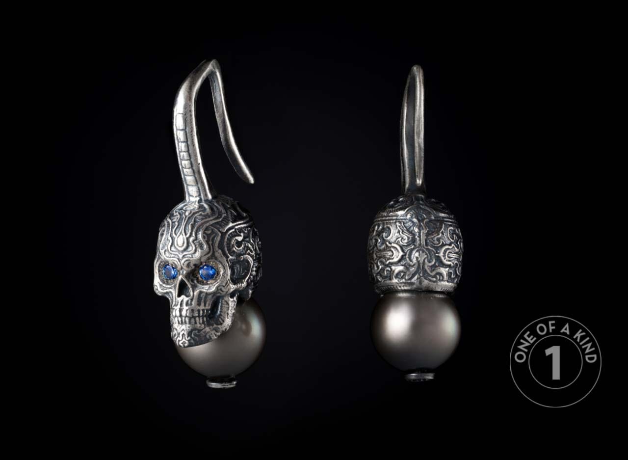 One of a kind earrings from William Henry featuring sapphires and South Sea pearls.