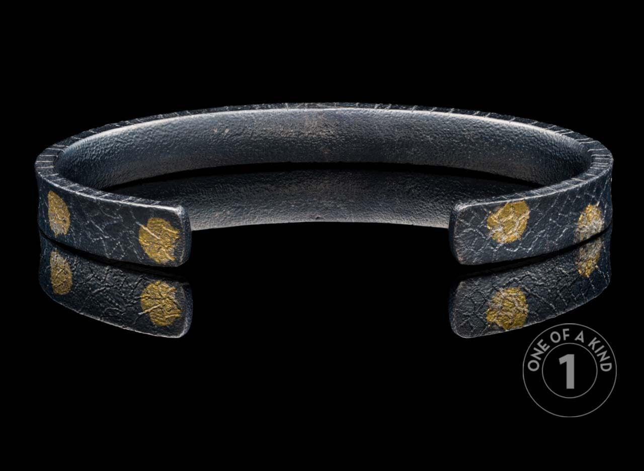 One of a kind cuff bracelet from William Henry featuring textured sterling silver and 23.5K Yellow gold