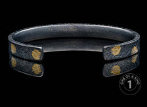 One of a kind cuff bracelet from William Henry featuring textured sterling silver and 23.5K Yellow gold