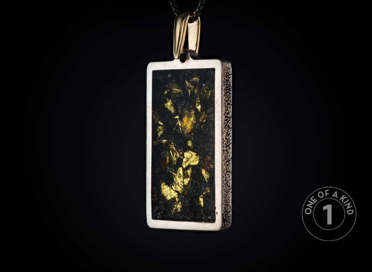 One of a Kind necklace from William Henry featuring a sterling silver pendant with 23.5K Yellow gold foil.