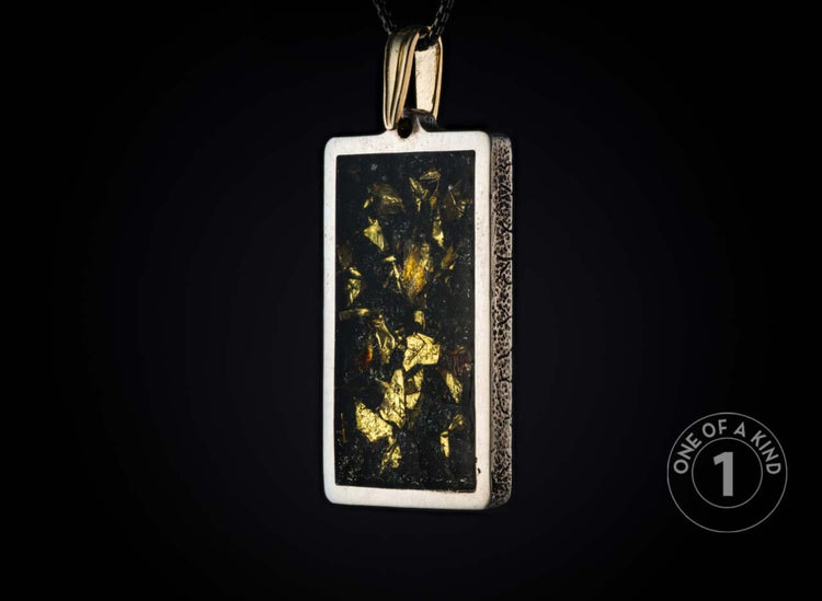 One of a Kind necklace from William Henry featuring a sterling silver pendant with 23.5K Yellow gold foil.