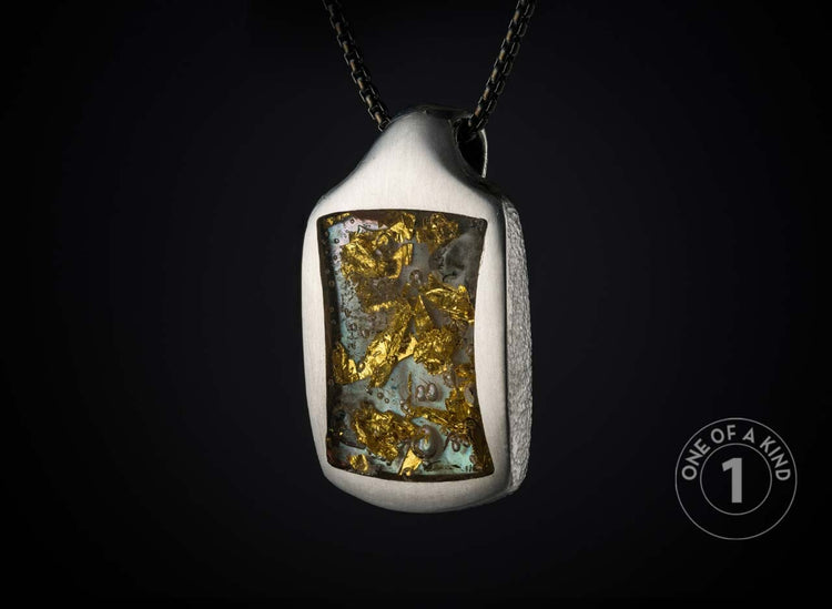 One of a kind sterling silver pendant necklace featuring 23.5K Yellow gold foil