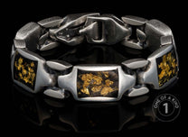 One of a kind bracelet from William Henry featuring sterling silver links and 23.5K yellow gold foil