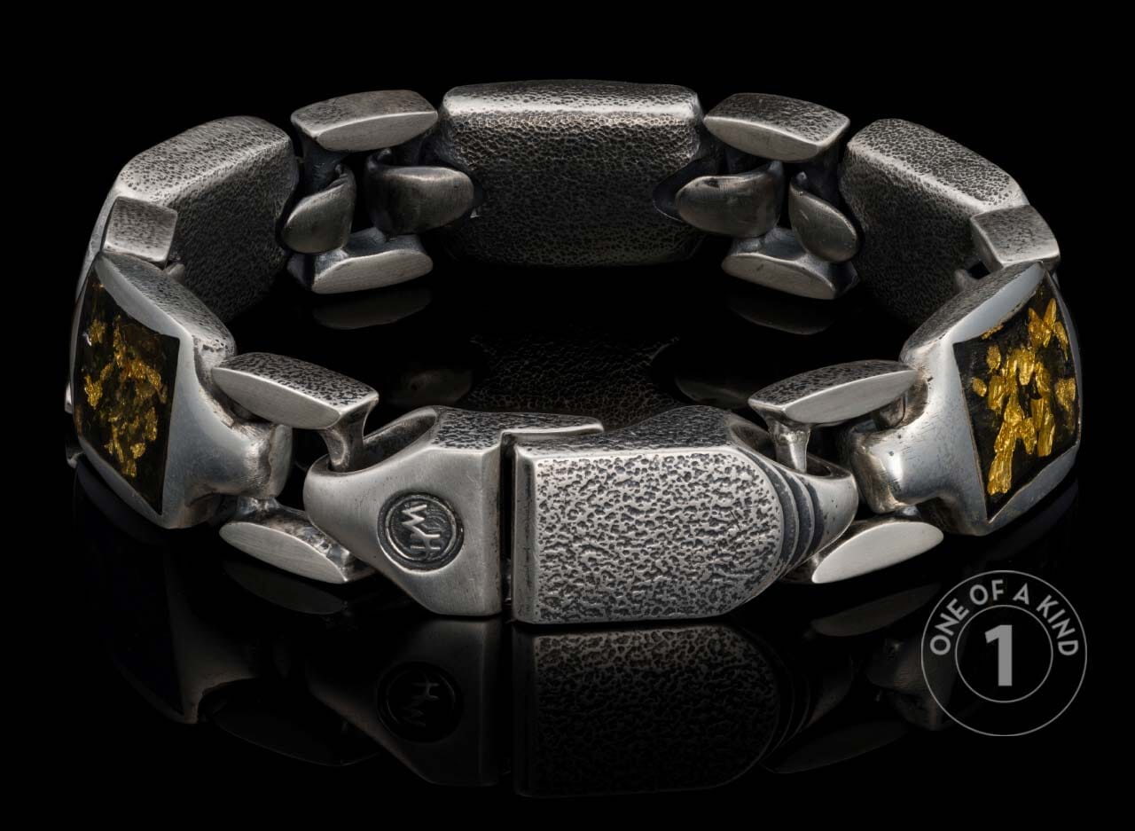 One of a kind bracelet from William Henry featuring sterling silver links and 23.5K yellow gold foil