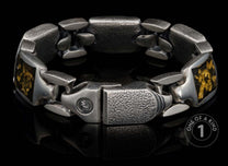 One of a kind bracelet from William Henry featuring sterling silver links and 23.5K yellow gold foil