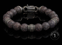 One of a kind bracelet from William Henry featuring dinosaur bone and sterling silver beads.