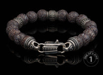 One of a kind bracelet from William Henry featuring dinosaur bone and sterling silver beads.