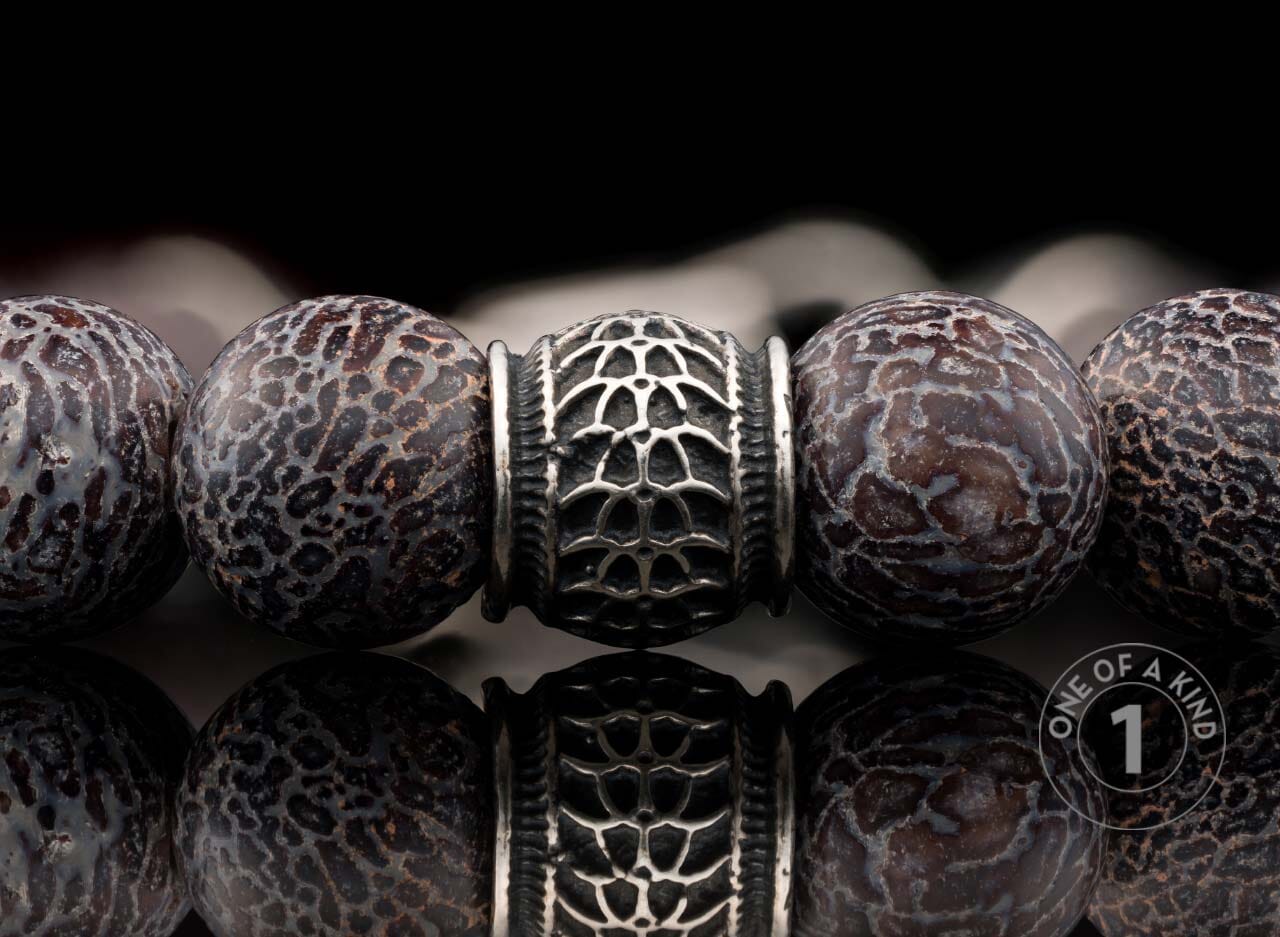One of a kind bracelet from William Henry featuring dinosaur bone and sterling silver beads.
