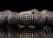 One of a kind bracelet from William Henry featuring dinosaur bone and sterling silver beads.