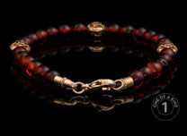 One of a Kind bracelet from William Henry featuring Cognac Amber beads and18K Rose gold beads.