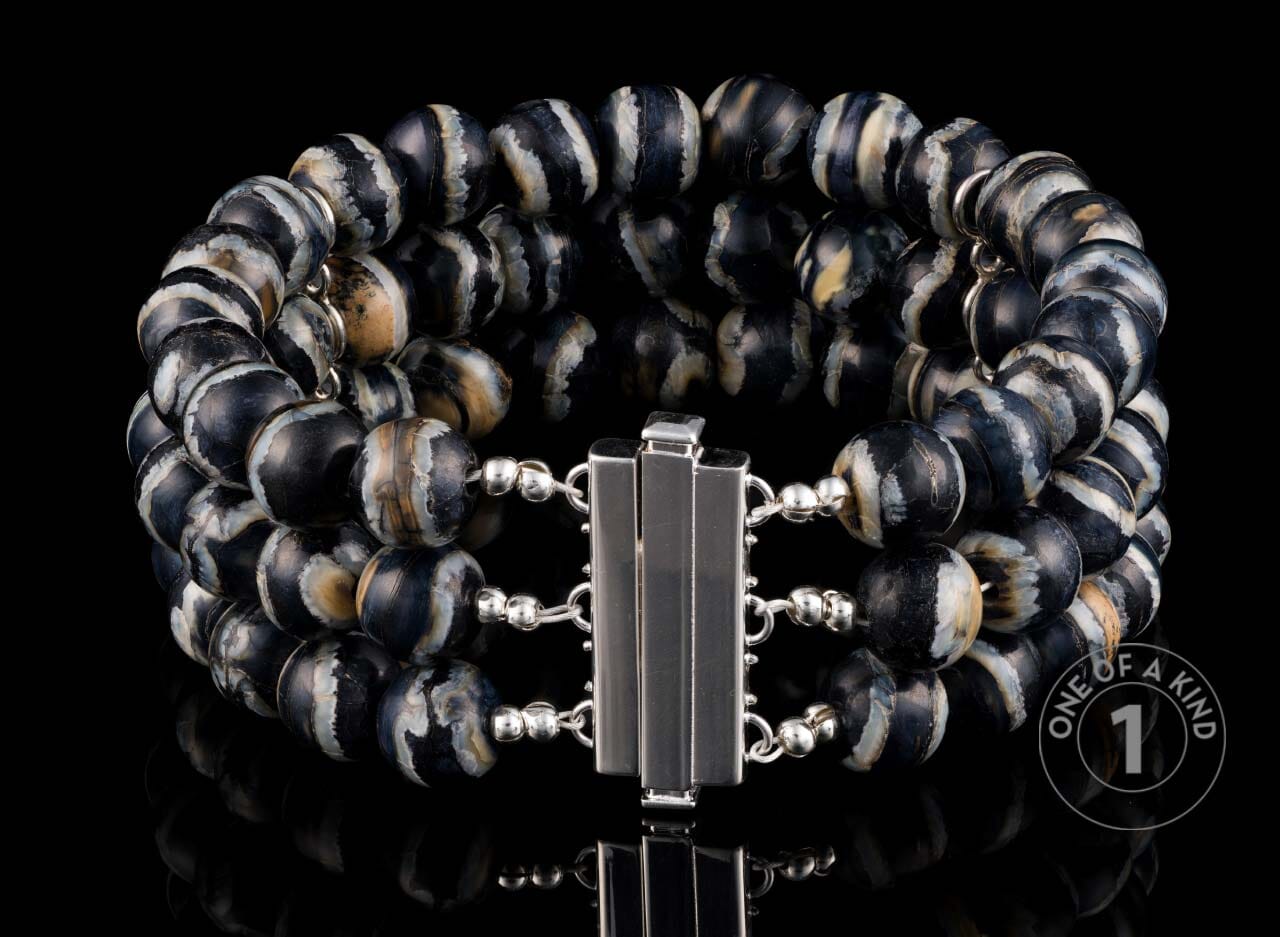One of a Kind bracelet from William Henry featuring mammoth tooth beads with a sterling silver clasp & fittings.