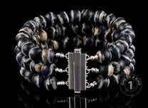 One of a Kind bracelet from William Henry featuring mammoth tooth beads with a sterling silver clasp & fittings.