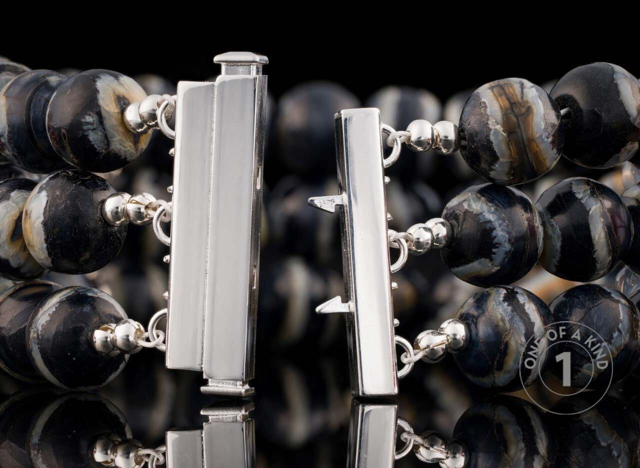 One of a Kind bracelet from William Henry featuring mammoth tooth beads with a sterling silver clasp & fittings.