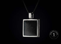One of a kind sterling silver pendant necklace from William Henry featuring a laser engraved black jade inlay.