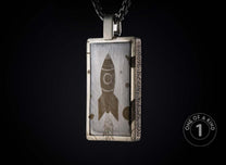 One of a kind sterling silver pendant necklace from William Henry featuring a laser engraved meteorite inlay.