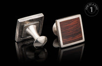 Pair of square cufflinks featuring textured silver-toned metal and dark wood inlay, one from front and one from back.