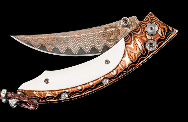 One of a kind custom William Henry knife with Damascus steel, Heat-colored 'Wave' Mokume, Fossil walrus bone and Smoky Quartz
