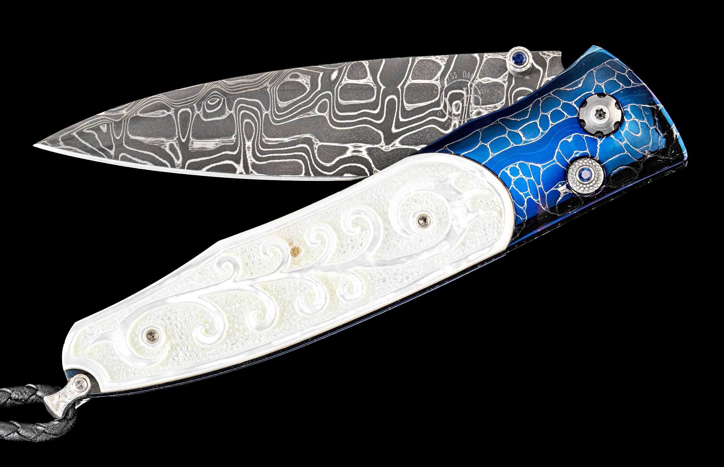 One of a kind William Henry custom knife with hand forged Damascus steel blade, Heat-blued 'Croc Skin' Damascus steel frame, Hand-carved mother of pearl, and Sapphire gemstones.